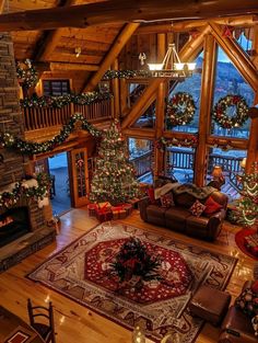 a living room filled with furniture and christmas decorations on top of a wooden floor covered in lights