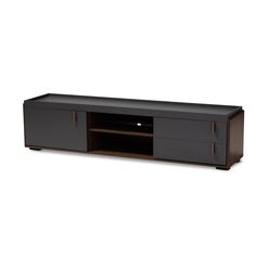 an entertainment center with a black cabinet and brown doors