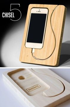 an iphone charging in a wooden box