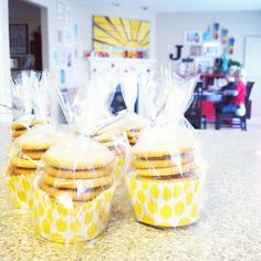 cookies wrapped in plastic sitting on top of a counter