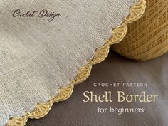 crochet pattern shell border for beginners on the front and back of two balls of yarn