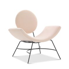 a white chair sitting on top of a metal stand next to an egg shaped object