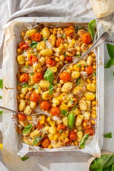 a square casserole dish filled with roasted vegetables