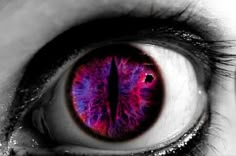 an eye with purple and pink colors