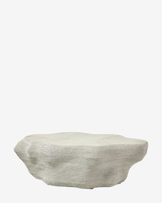 a white bowl sitting on top of a table