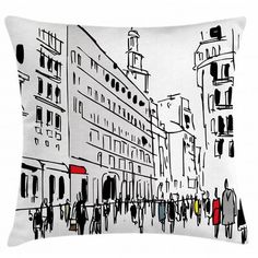 a black and white pillow with an image of people walking on the street in front of buildings