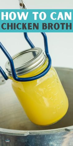 a mason jar filled with yellow liquid sitting on top of a metal pan and the words how to can chicken broth