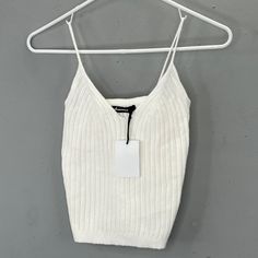 New With Tags Olivaceous Sweater Knit Tank Top In Ivory. Ribbed, Stretchy, Spaghetti Straps. Size S. Chest: 11-1/2" Across Length: 16" Condition: New With Tags Trendy Knit Top With Spaghetti Straps, Trendy Knit Tops With Spaghetti Straps, White Ribbed Knit Tank Top, White Knit Crop Top Tank Top, Spring Ribbed Cami Knit Top, Fitted Knit Top With Spaghetti Straps, White Seamless Knit Crop Top, Chic Knit Cami Crop Top, Chic Knit Top With Spaghetti Straps