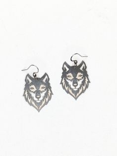 Intricately cut stainless steel wolf charms. Stainless steel Hooks Silver Wolf Design Stainless Steel Jewelry, Silver Stainless Steel Wolf Design Jewelry, Silver Stainless Steel Wolf Jewelry, Wolf Accessories, Wolf Earrings, Pastel Outfits, Cloth Design, Alt Outfits, Pastel Outfit