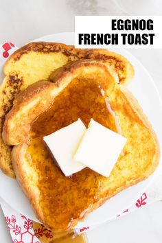 two pieces of french toast on a plate with butter