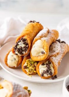 an easy homemade cannolis recipe on a white plate