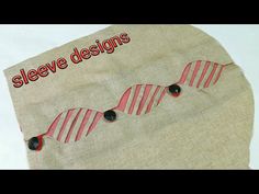 a close up of a piece of cloth with buttons on it and the words sleeve designs