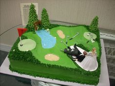 a wedding cake is decorated with golf scenes