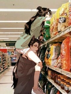 a woman is standing in front of a store shelf