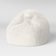 a white bean bag sitting on top of a table