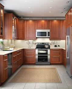 a kitchen with wooden cabinets and stainless steel appliances