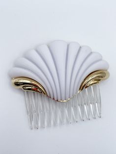 "Stunning French Vintage White Tulip Hair Comb! Lovely soft white and bright gold colors pair with most outfits. Perfect gift for the vintage lover / collector. Details: * Made in France * Available in White/Gold Combo * Clear Hair Comb * Decorative Element: 2.75\" x 1.75\" * Total Size: 2.75\" x 2.75\"" French Comb, Clear Hair, Earth Mother, Gold Hair Comb, Vintage Hair Combs, Hair Accessories Collection, Gothic Accessories, Purple Iris, White Tulips