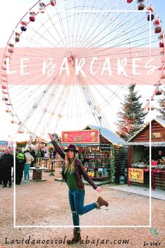 a woman standing in front of a ferris wheel with the words le parkcakes on it