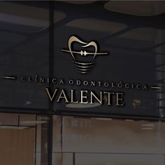 the logo for clinica donttologicca valentee is shown in gold and black