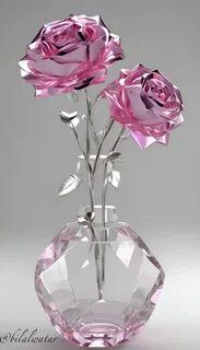 three pink roses in a clear glass vase