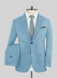 Give yourself a modish look with our Marco Stretch Pastel Blue Wool Suit. Meticulously fashioned from a wool blend, it boasts a delightful amount of stretch for that added touch of freedom. The pastel blue hue with a solid pattern offers a refreshing twist without veering into overly bold territory. Whether you're turning heads at a social gathering or aiming to infuse a dash of personality into your everyday style, this suit effortlessly takes center stage as your go-to chic upgrade.   Look Inc Black Tuxedo Shirt, Grey Tweed Suit, Windowpane Suit, Herringbone Tweed Jacket, Seersucker Suit, Tweed Pants, Herringbone Jacket, Denim Suit, Herringbone Tweed