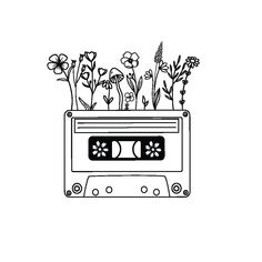 a cassette with flowers growing out of it