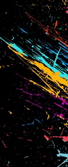 an image of colorful paint splattered on black background