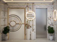 the entrance to an office building with marble walls and gold trimmings