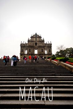 stairs leading up to a building with the words one day in macau written on them