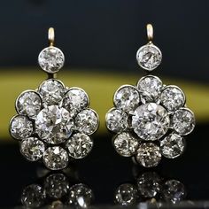 4.80 TCW Round Old European Cut Colorless Moissanite Diamond Earrings, Bezel Halo Designer Drop Earrings, Leverback Antique Diamond Earrings ✹✹𝐖𝐞𝐥𝐜𝐨𝐦𝐞 𝐭𝐨 𝐂𝐫𝐚𝐳𝐲𝐃𝐢𝐚𝐦𝐨𝐧𝐝𝐬𝐂𝐨✹✹ Detail about stones Moissanite : ----------------------------- Stone Shape: Round Old European Cut  Stone Size: 6 mm & 3.50 mm  Weight: 4.80 TCW  Color: Colorless Cut: Excellent Clarity: VVS ★ 𝑰𝒕𝒆𝒎 𝑫𝒆𝒕𝒂𝒊𝒍𝒔:- ☛ Metal Purity: Solid Gold (10KT, 14KT, 18KT); Silver(925 Sterling, 935 Argentium), 950 Platinum ☛ Metal Tone: Yellow, White, Rose ☛ Stamp/Hallmark: Yes ★ 𝑪𝒖𝒔𝒕𝒐𝒎𝒊𝒛𝒂𝒕𝒊𝒐𝒏:- ☛ Customized Design Jewelry. ☛ All cuts which you dream to make with moissanite. ☛ Updating every step of your ordered jewelry(Loose Stone, CAD & Making Process) ☛ All listed items in our stores are ma Luxury Antique Earrings In Diamond White, Antique Diamond Earrings, Vintage Diamond Earrings, Diamond Chandelier Earrings, Diamond Chandelier, Diamond Cluster Earrings, Platinum Metal, Antique Diamond, Cluster Earrings