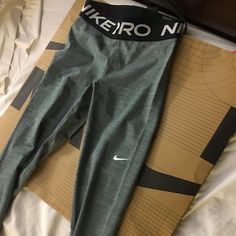 Nike Pro Womens Leggings, Gray, Black Strap, Xs Nike Sports Bottoms, Fitted, Nike Tight Sports Bottoms, Fitted Nike Tights For Gym, Nike Fitted Sportswear Bottoms, Nike Fitted Leggings For Athleisure, Tight Nike Sports Bottoms, Nike Fitted Sports Bottoms, Nike Tight Workout Bottoms, Fitted Nike Workout Pants