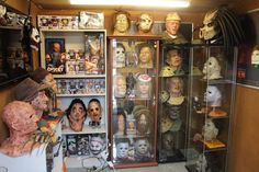 a display case filled with lots of halloween masks