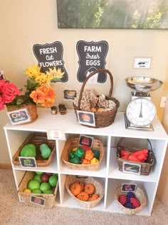 there are many baskets and fruits on the shelf