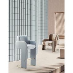 two chairs sitting next to each other in front of a wall with vertical lines on it