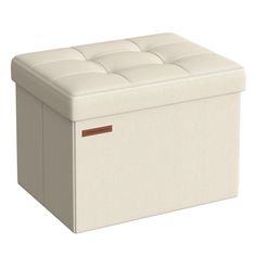 a white storage box sitting on top of a floor