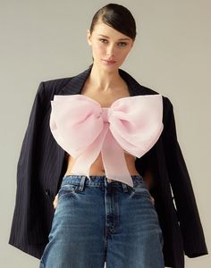 Soft blush pink oversized organza bow bandeau top. Oversized 3D appliqué organza bow Strapless bandeau style top Fabric content: 100% polyester Care instructions: dry clean only Fit: model is 5'10" and wears a size S. Complete the look: Oversized Wool Blazer Dopamine Outfits, Bow Bandeau, Cupid's Bow, Organza Bow, Cupids Bow, Fashion School, Strapless Bandeau, Top Fabric, Bandeau Top