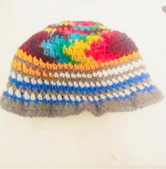 Chakra colors and NY colored beanie for our hippy tribe.  This is a new atyle that fits right above the top of your ear and brow, it fits like a mushroom hat and has a cool strioes pattern and sprial pattern at the top/center of the crochet hat.  This is uniswx and can git children and adults.  Donations can go to your favorite organization.  Please detail in the messages. Happy New Year and thank you for the continued support #teamjennmoves and #teamjennsjewelz. Casual Colorful Adjustable Crochet Hat, Casual Adjustable Colorful Crochet Hat, Colorful Adjustable Crochet Hat, Colorful Adjustable Casual Crochet Hat, Casual Beanie For Festivals, Casual Rainbow Hat One Size, Funky Winter Festival Hats, Casual Rainbow Hat One Size Fits Most, Casual Rainbow Hat, One Size Fits Most