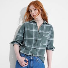 Flannel button-down shirt from Wild Fable™ with a plaid pattern. Made from lightweight cotton. Designed in an oversized fit with a collared neckline, full front button-down closure, chest patch pocket and long sleeves with buttoned cuffs. Tunic-length shirttail hem completes the stylish look. If you're not satisfied with any Target Owned Brand item, return it within one year with a receipt for an exchange or a refund. Wild Fable™: A look for every story. 32nd Birthday, Pig Roast, Western Denim Shirt, Pocket Tunic, Oversized Flannel, Tops Long Sleeve, Brown Plaid, Hem Style, Lace Shirt