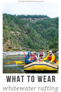 a group of people riding on the back of a raft down a river