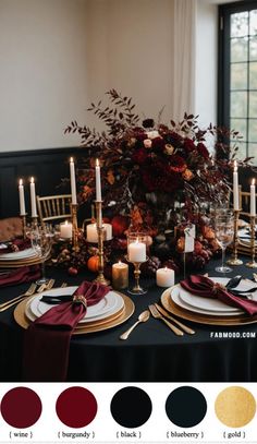 the table is set with black, burgundy and gold place settings for an elegant fall wedding