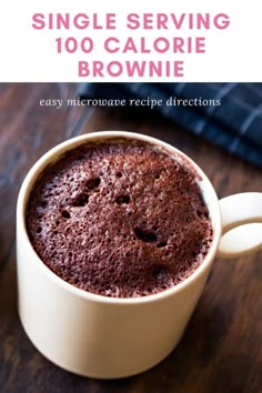 a close up of a cup of coffee on a table with the words single serving 100 calorie brownie