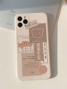 an iphone case with some stickers on it