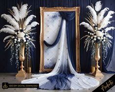 two tall vases with white flowers and blue drapes in front of a gold frame