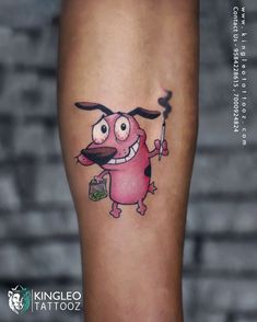 A Courage the Cowardly Dog tattoo with intoxication and weed represents a playful and humorous connection to the show and cannabis culture. Courage The Cowardly Dog Tattoo, Courage Tattoos, Feminine Skull Tattoos, Courage The Cowardly Dog, Sigil Tattoo, Cowardly Dog, Mens Shoulder Tattoo, Small Tattoo Ideas