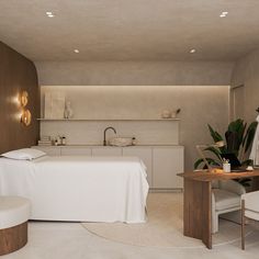 a large bathroom with a sink, toilet and bathtub next to a counter top