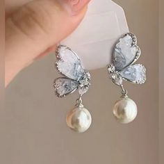 Silver And Blue Butterfly Faux Pearl Dangle Earrings, Nwt Dangly Butterfly Earrings, Blue Butterfly Accessories, Sky Blue Earrings, Light Blue Earrings, Pretty Earrings Dangle, Butterfly Dangle Earrings, Ball Ideas, Silver Butterfly Earrings, Yule Ball