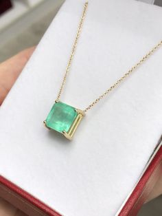 Featured here is a 4.63-carat stunning, Colombian emerald necklace in fine 14K yellow gold. Displayed in the center is a bluish-green emerald with very good clarity, minor flaws are visible to the eye as no emerald is perfect. Accented by a simple four-prong gold mount, allowing for the emerald to be shown in full view. The earth mined, green Colombian emerald has a desirable lush green color with excellent qualities. An 18 inch is attached to the emerald pendant. This necklace is ideal for ever Exquisite 14k Gold Green Jewelry, Fine Jewelry Yellow Gold Emerald Necklace With Diamond Cut, Exquisite Green 14k Gold Jewelry, Yellow Gold Emerald Necklace With Prong Setting, May Birthstone Emerald Necklace In Yellow Gold, Anniversary Emerald Necklace In Yellow Gold, Anniversary Yellow Gold Emerald Necklace, Emerald Necklace With Diamond Cut In Fine Jewelry Style, Luxury Yellow Gold Emerald Necklace With Prong Setting