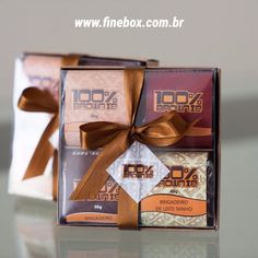 three bars of chocolate wrapped in brown ribbon