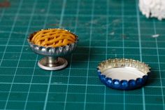 two miniature pies sitting on top of a table