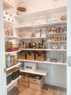 an organized pantry with baskets and bread